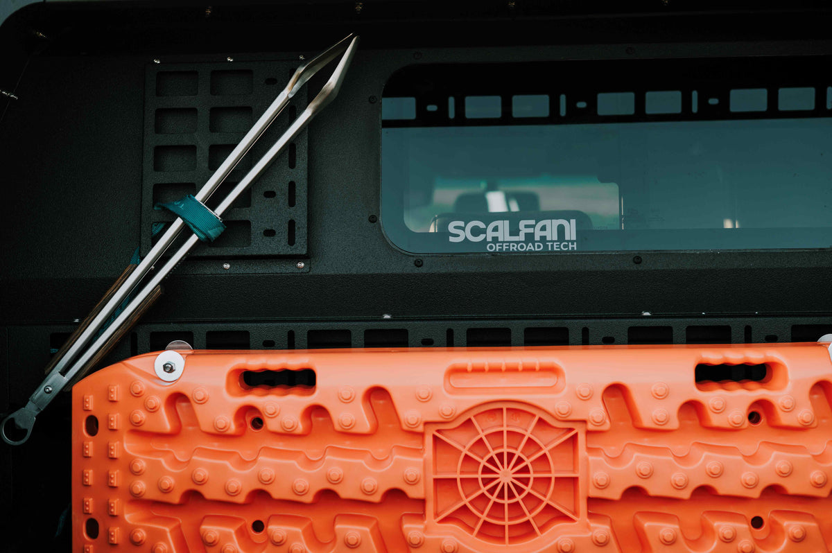Glazing between Cab and Load Bin